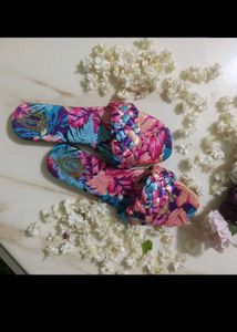 multicolored textured flats