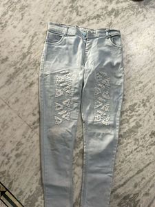 Ripped Light Wash Denim Jeans