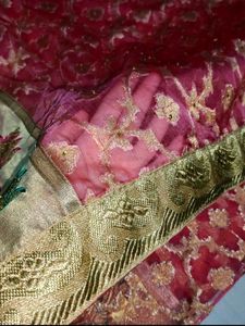 Reddish pink party wear organza tissue silk saree