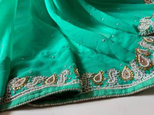 Stunning pear handwork Saree