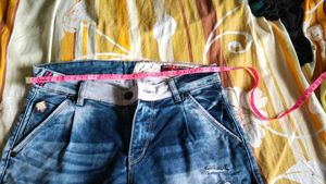 Distressed Blue Wash Denim Jeans