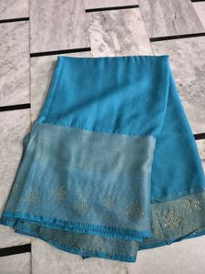 Elegant Teal Saree with Embellished Border