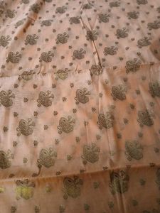 Elegant Peach Saree with Intricate Gold Print