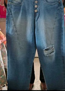 Distressed Blue Denim Jeans