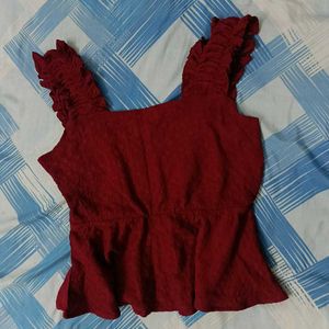 Maroon textured sleeveless top