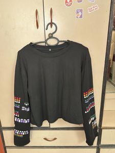 Black long sleeves patterned top