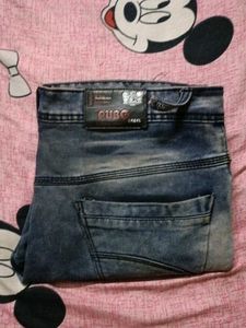 Distressed Blue Denim Jeans