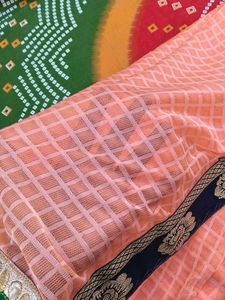 Elegant Peach Saree with Floral Border
