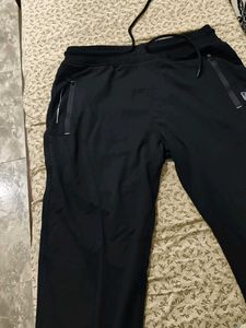 a black solid track pant