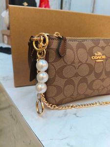 Coach Nolita light brown 🤎 with pearl