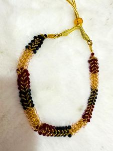 Multicoloured beaded neckpiece & clutches