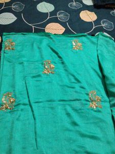 Elegant Teal Saree with Gold Embroidery