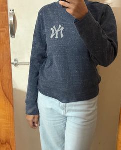 Combo of sweatshirt and jeans