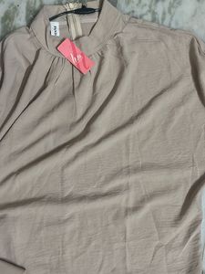 Elegant Beige Top with Button Cuffs