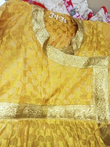 Elegant Yellow Kurta Set with Golden Border
