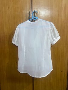 Elegant White Ruffled Blouse