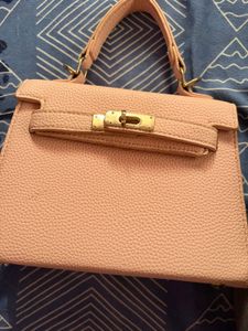 Chic Pink Textured Handbag