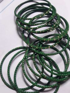 Set of Green Bangles with Gold Accents