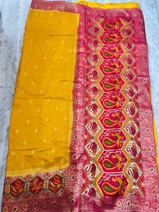 Vibrant Yellow Silk Saree with Intricate Weave