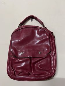 Chic Maroon Faux Leather Backpack