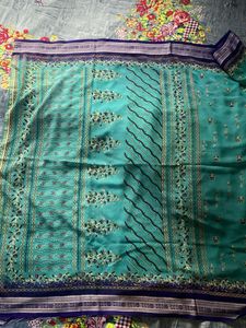 Teal Saree with Floral Motifs