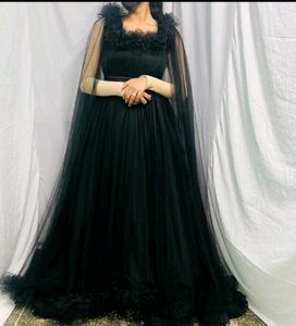 Elegant Black Gown with Cape