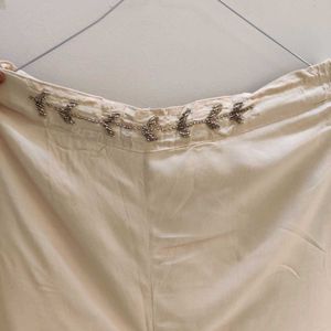 Elegant Beige Palazzos with Embellished Waist