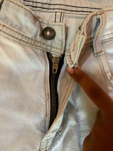 Light Wash Distressed Denim Jeans