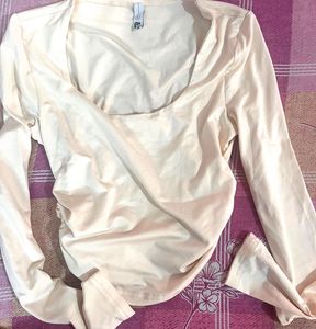 Newme Cream Ruched Long Sleeve top