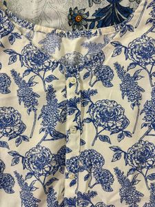 Blue Sleeveless Peplum Top