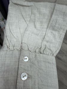 beige long sleeve embroidery top