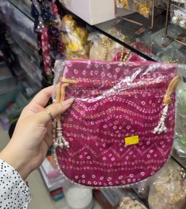 Elegant Potli Bag with Pearl Handle (any1)