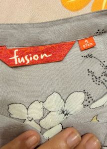Grey sleeveless floral kurti