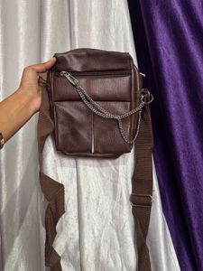 brown sling bag