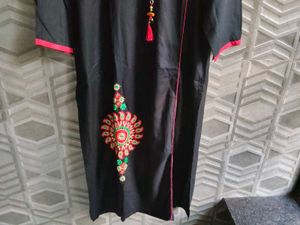 Elegant Black Kurta with Red Accents