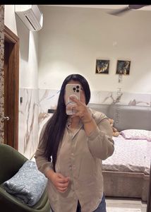 beige yellow shirt and heels