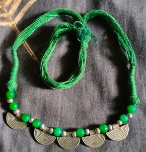 Green Beaded Necklace with Silver Charms