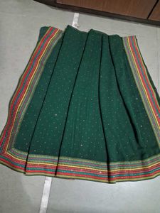 Elegant Green Saree with Embellishments