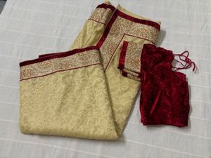 Festive Cream Saree with Red Blouse