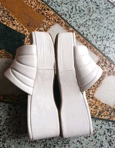 White platform heels