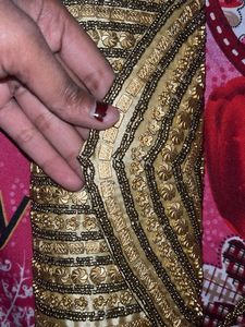 Elegant Gold Embellished Clutch