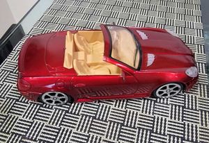 Two toys - Buggy and Racing car to