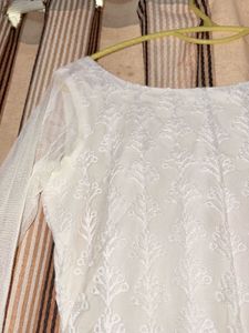 Elegant White Chikankari Kurta with golden embelli