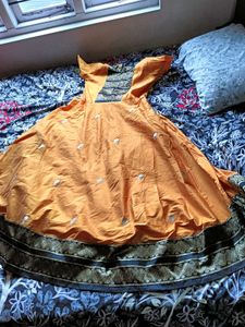Orange Lehenga Choli with Embellishments