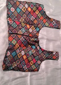 multi colour sleeveless blouse