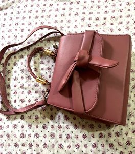 Chic Pink Handbag with Bow Detail