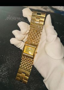 Glamorous Gold Tone Crystal Watch