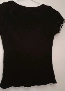 Black Ribbed Lettuce Trim Crop Top