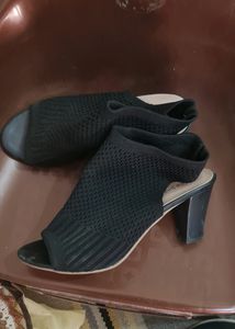 Black Toe Covering Heels