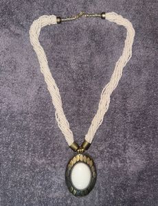 Elegant Beaded Necklace with Statement Pendant